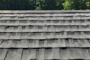 Old damaged roof before replacement